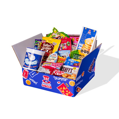 Snack box dulce con al menos 20 productos internacionales