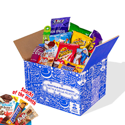 Snack box con al menos 40 productos internacionales: dulces, salados y bebidas.